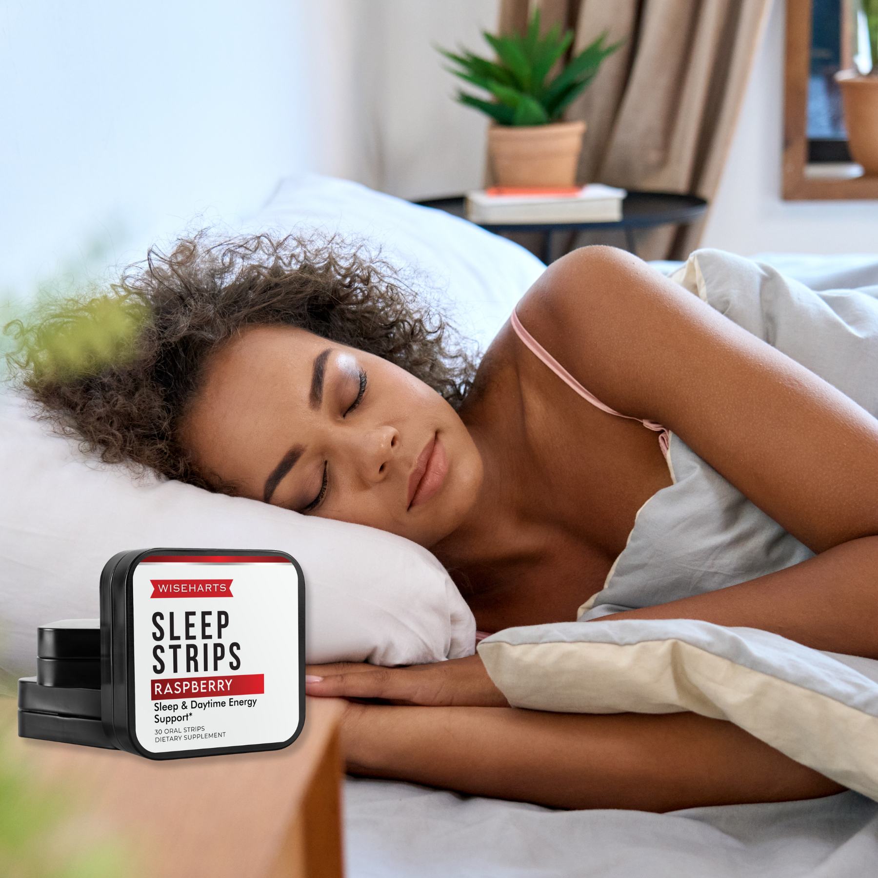 A beautiful woman sleeping soundly with Wiseharts Sleep Strips